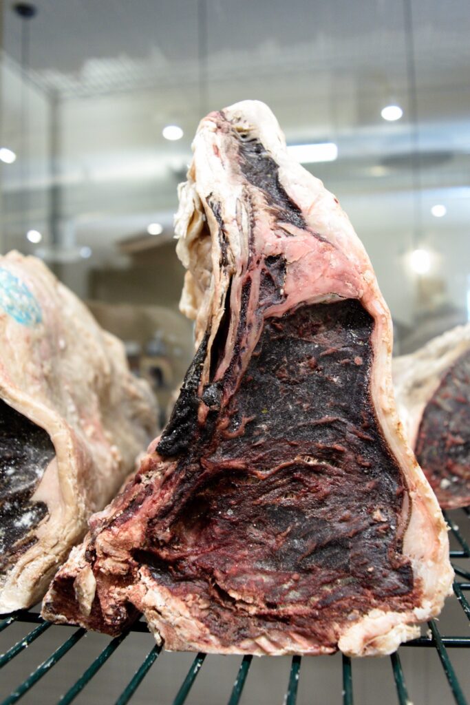 Angus Beef Loin Aging in a Butcher Shop Window