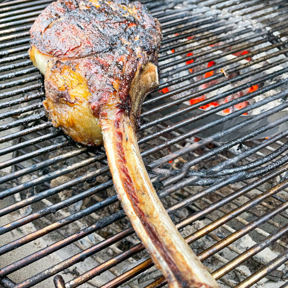 Tomahawk Steak grilled on a charcoal grill