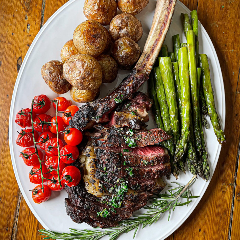 Serve tomahawk on a platter with the bone for presentation