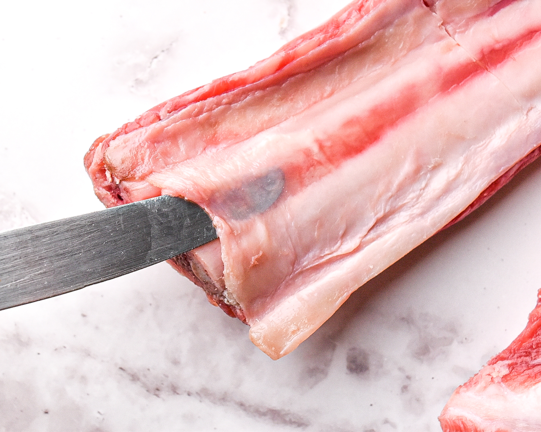 Removing the membrane from beef ribs