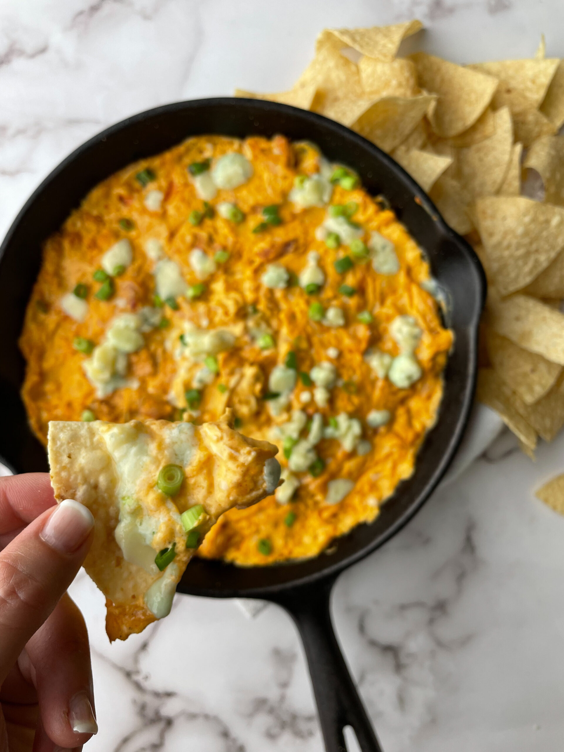 Buffalo Chicken Dip on a tortilla chip