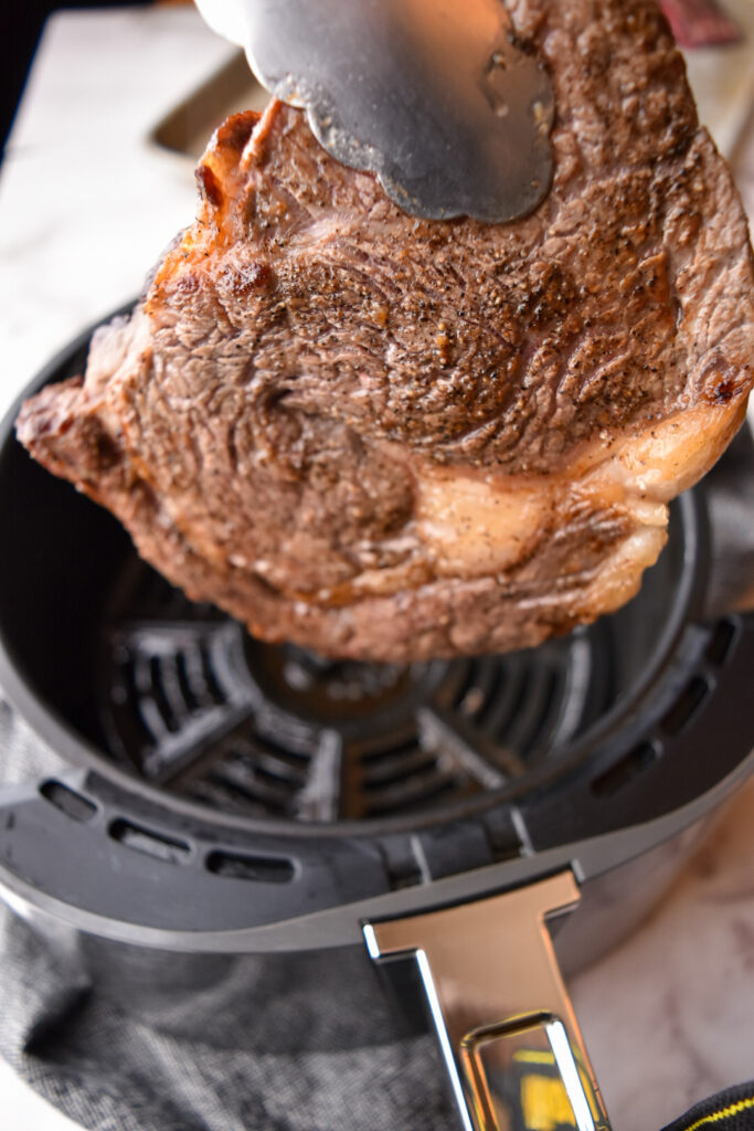 Air Fryer Ribeye steak cooked to medium-rare