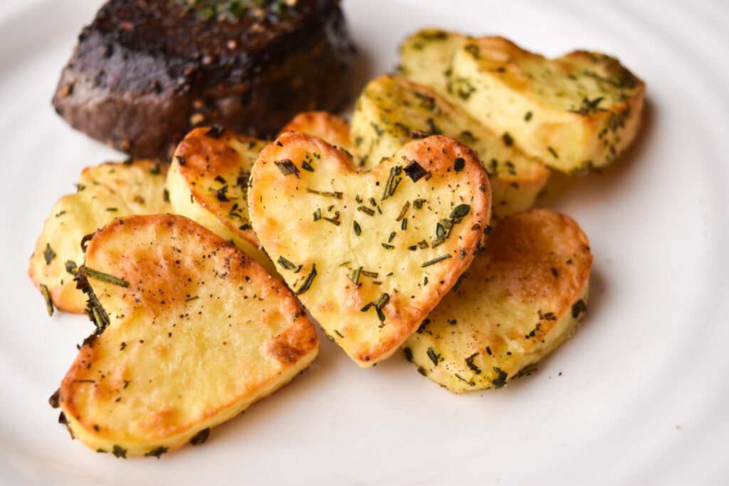 Valentine's Day Meal with Roasted Heart Shaped Potatoes and Beef Tenderloin