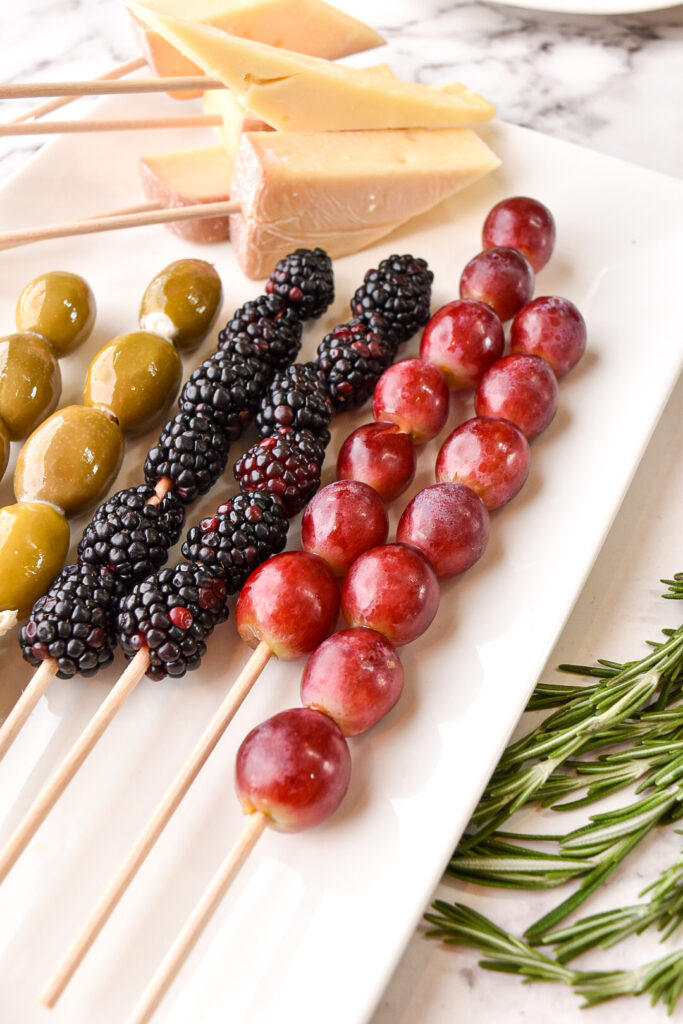 Skewered fruits and olives fora DIY charcuterie meat bouquet