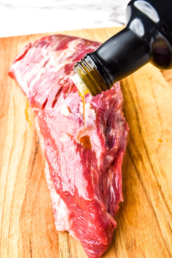Olive oil on a tri tip before applying a dry run